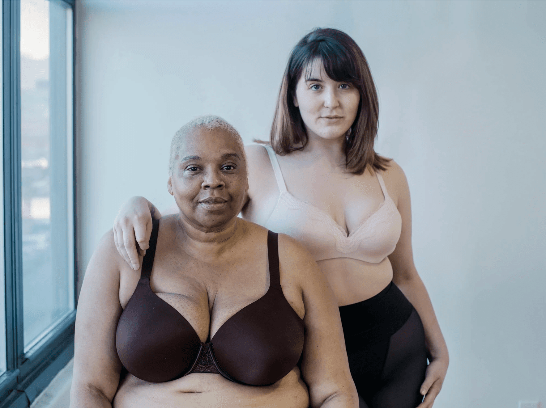 Woman with jumper smiling in profile